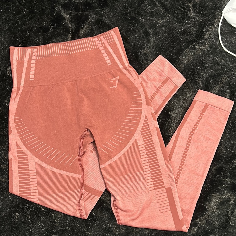 Gymshark leggings- red/pink color. Look super cute on with the design :)